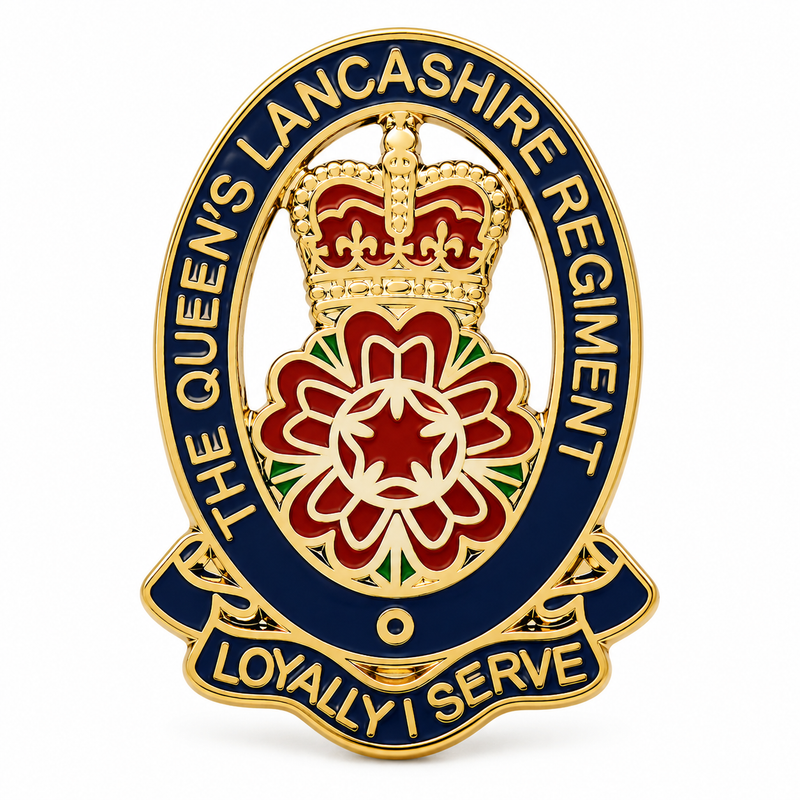 A Queen's Lancashire Regiment military badge pin featuring a gold-tone crown, red and white rose, and navy blue scrollwork with the text 'THE QUEEN'S LANCASHIRE REGIMENT' and 'LOYALLY I SERVE'.
