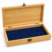 Open engraved wooden medal box with navy velvet lining