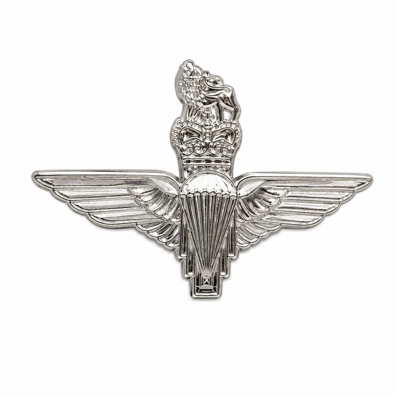 a parachute regiment silver lapel pin on a white background