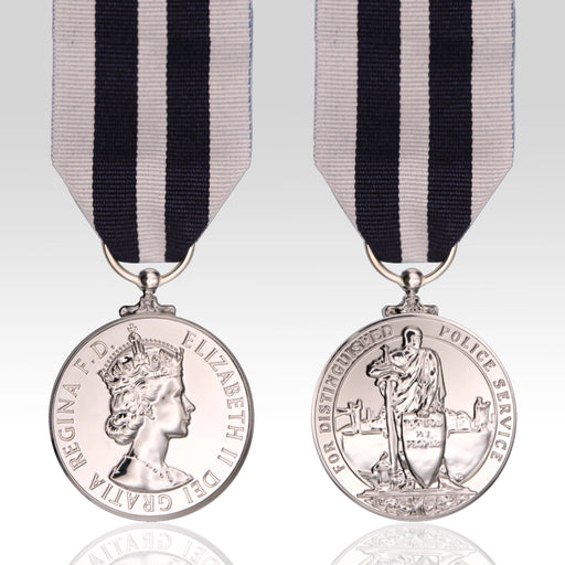 Full-size Queen's Police Medal QPM replica featuring the Queen Elizabeth II design and distinguished service medal ribbon.