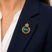 Woman's royal air force lapel badge on a navy lapel
